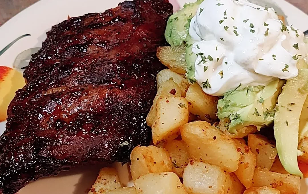 Spare ribs, avacados, and fried potatoes