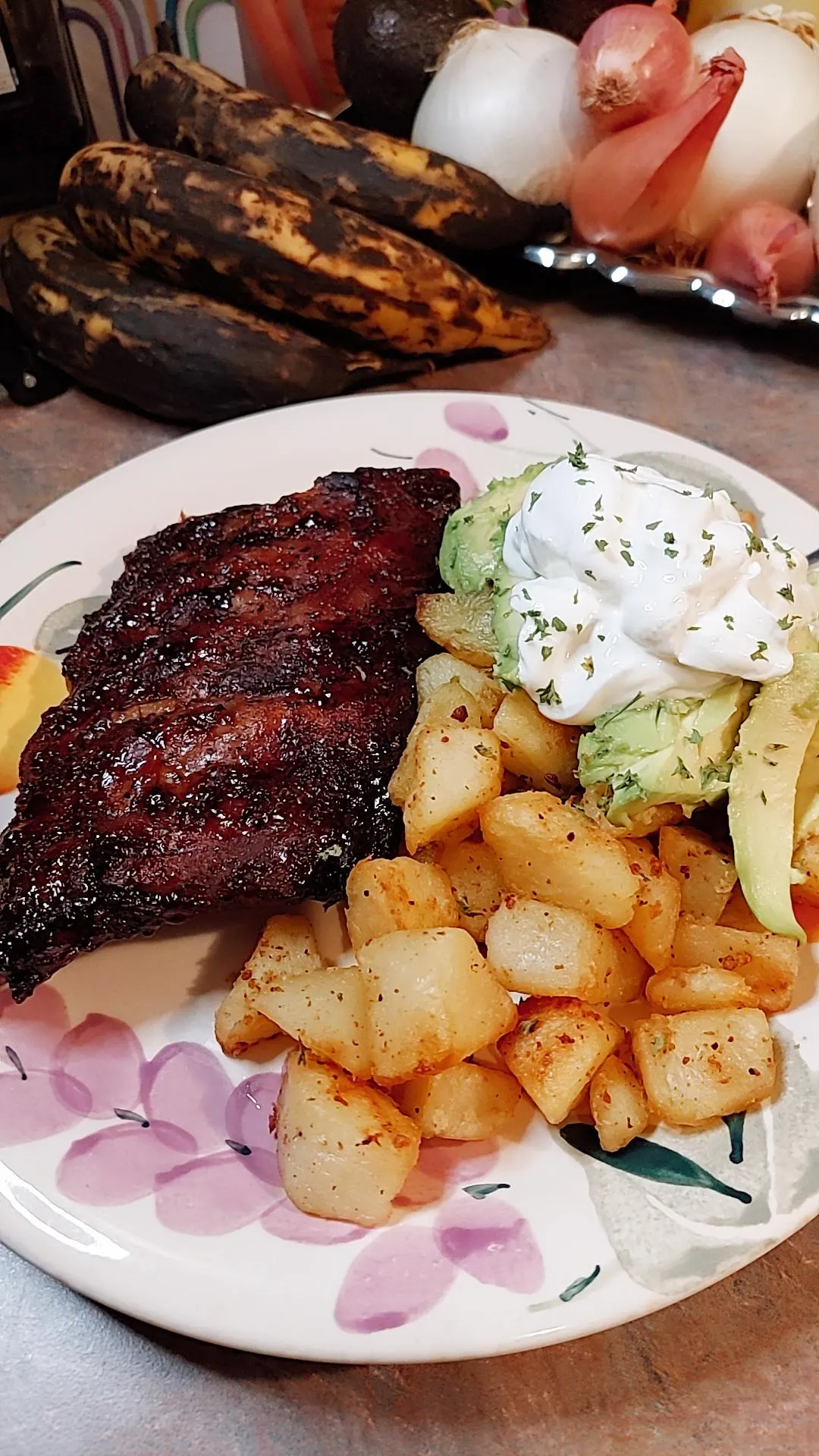 Spare ribs, avacados, and fried potatoes